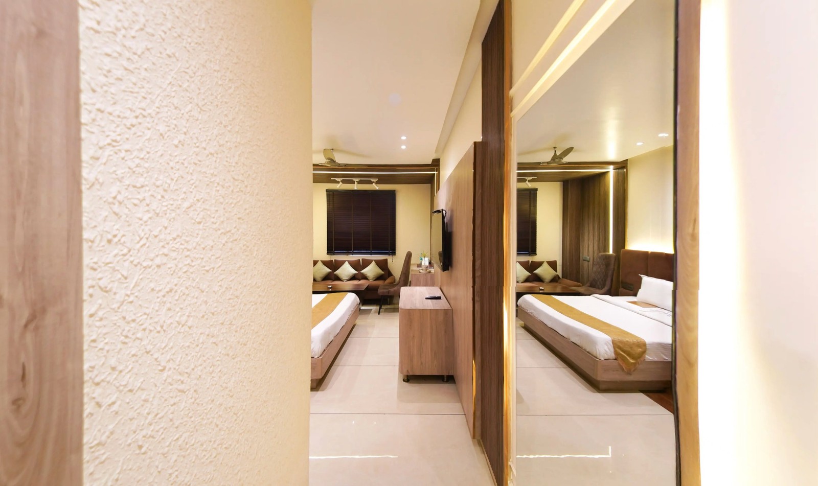 Classic Room Hotel Flora Haridwar - queen size bed with wooden interiors